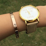 New Style 1 Pcs Lot All You Need Is Love Watch Words Printed Leather Watch For Womens Brown Strips 4633 | 24hours.pk