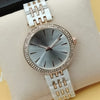 Women Rounded Diamonds Dial Watch White Dial And White & Golden Strip Chain 71631