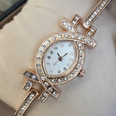 Fashionable Creative X Shaped Watch Golden For Her | 24hours.pk
